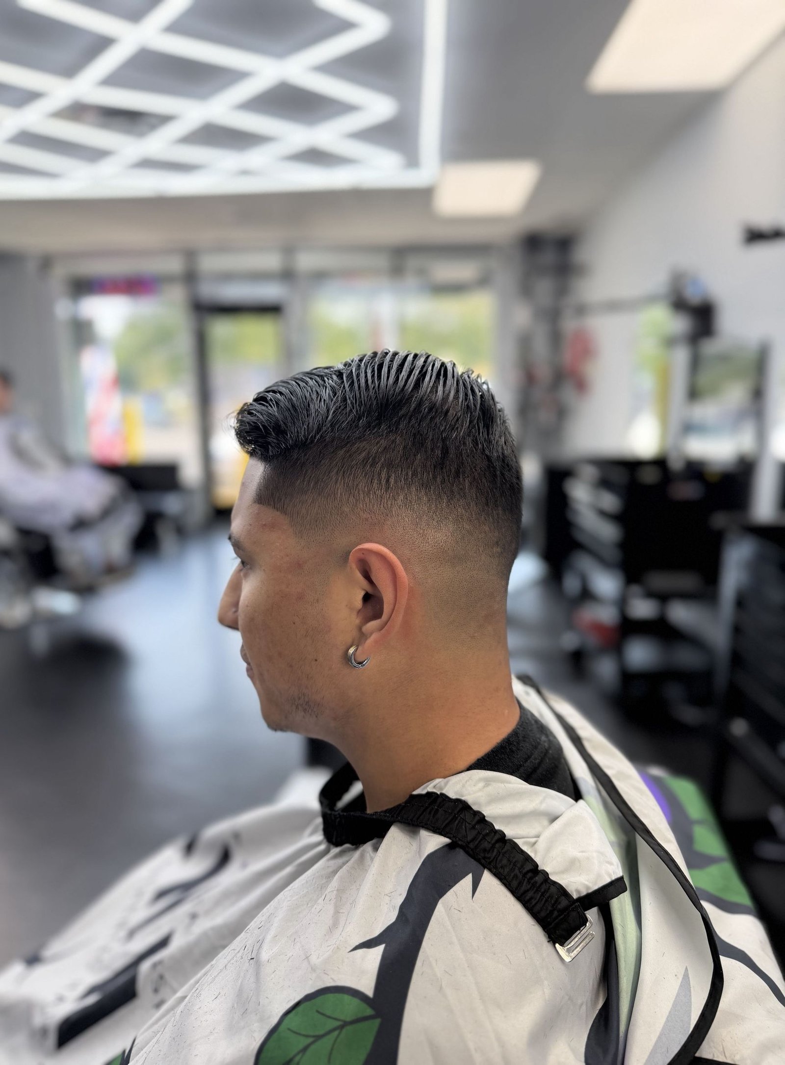 High fade with pompadour